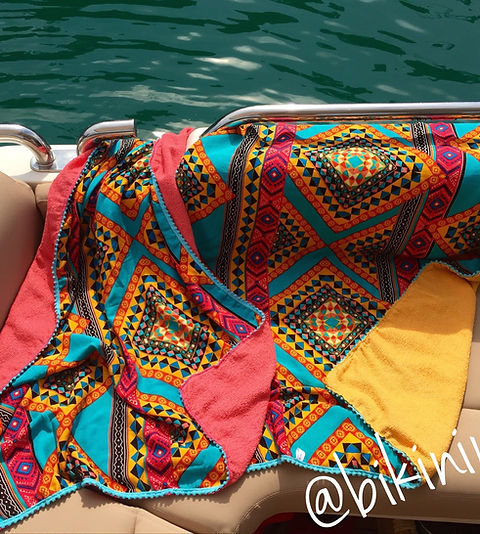 Canga Toalha vs. Toalha Tradicional: Qual a Melhor Opção para o Verão?