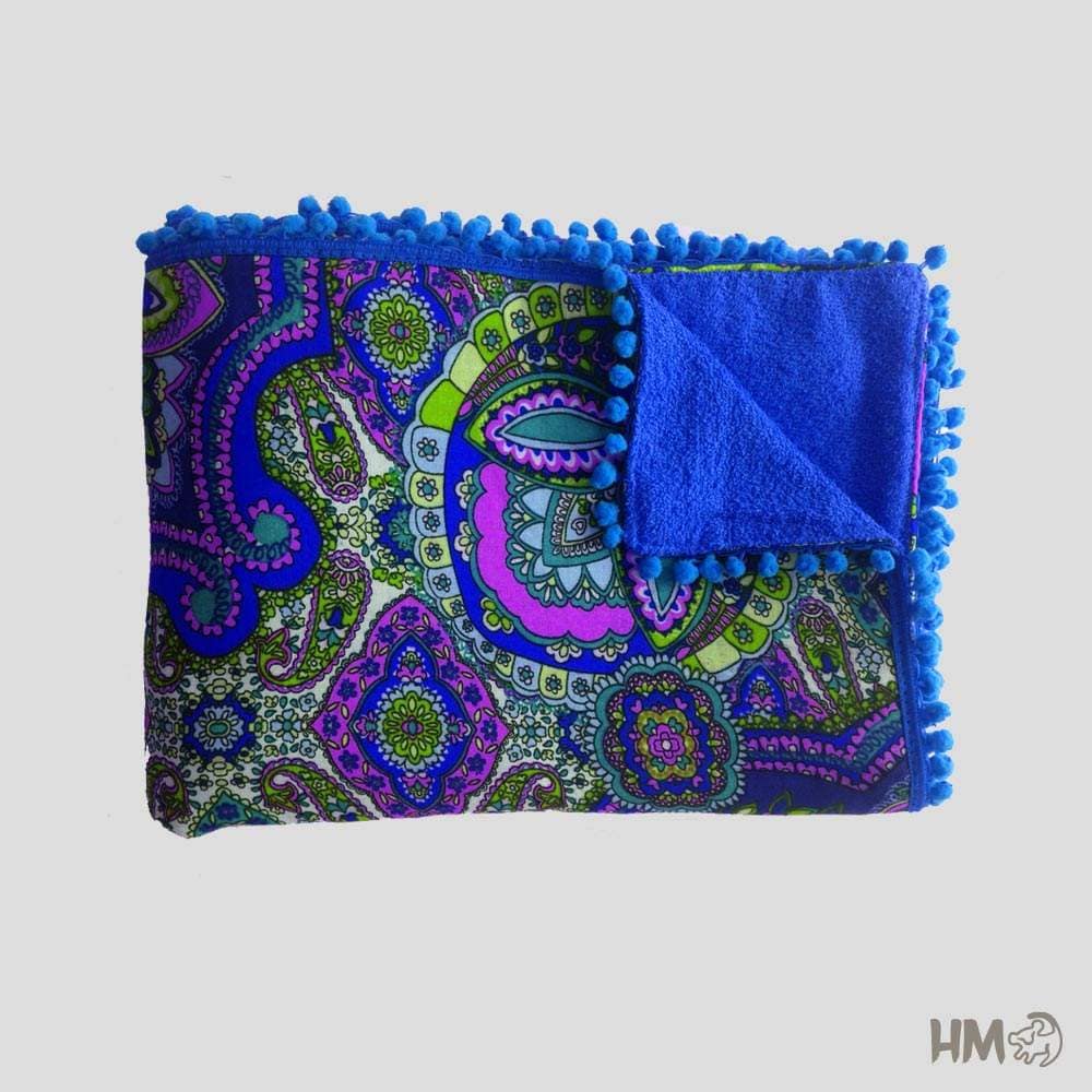 Canga Toalha vs. Toalha Tradicional: Qual a Melhor Opção para o Verão?