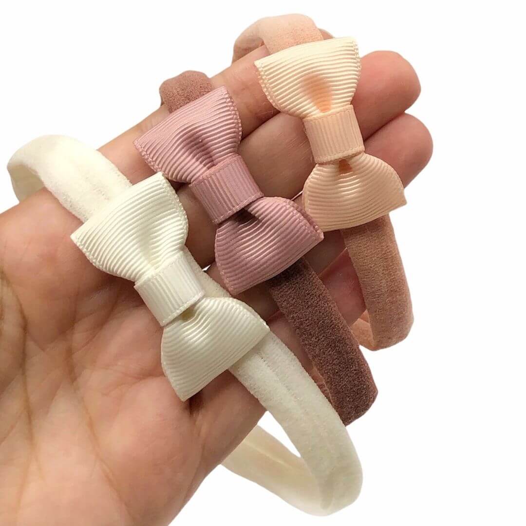 laço para faixa de bebe