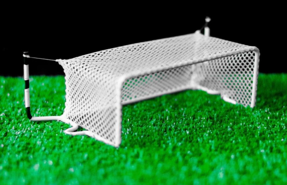 um jogo de futebol de botão